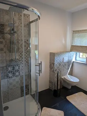 Ein Badezimmer in der Unterkunft Ferienwohnung zum Hühnerstall