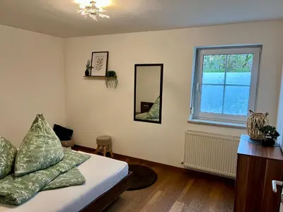 Ein Bett oder Betten in einem Zimmer der Unterkunft Ferienwohnung Seidl
