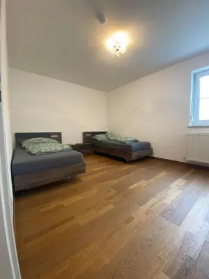 Ein Bett oder Betten in einem Zimmer der Unterkunft Ferienwohnung Seidl