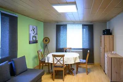 Ein Sitzbereich in der Unterkunft Ferienwohnung Kraus