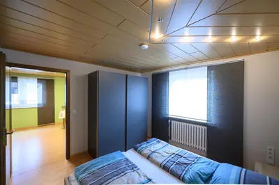 Ein Bett oder Betten in einem Zimmer der Unterkunft Ferienwohnung Kraus