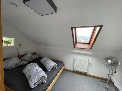 Ein Bett oder Betten in einem Zimmer der Unterkunft Ferienwohnung für Zwei