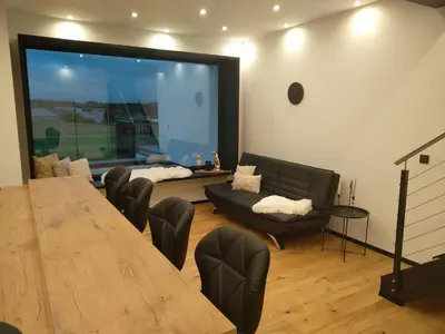 Ein Sitzbereich in der Unterkunft Lifestyle Cube House Appartment 2