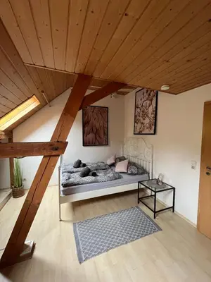 Ein Bett oder Betten in einem Zimmer der Unterkunft Heimerlmühle