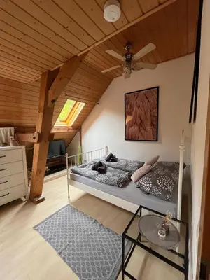 Ein Bett oder Betten in einem Zimmer der Unterkunft Heimerlmühle