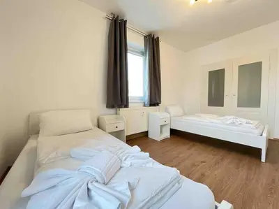 Ein Bett oder Betten in einem Zimmer der Unterkunft SAD231 - Moderne Monteurwohnung Übergangswohnung