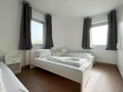 Ein Bett oder Betten in einem Zimmer der Unterkunft SAD231 - Moderne Monteurwohnung Übergangswohnung