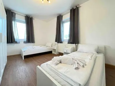 Ein Bett oder Betten in einem Zimmer der Unterkunft SAD231 - Moderne Monteurwohnung Übergangswohnung