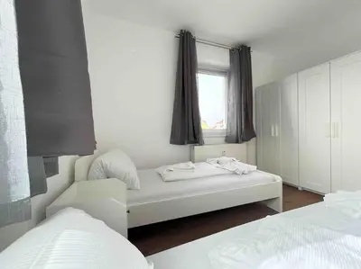 Ein Bett oder Betten in einem Zimmer der Unterkunft SAD231 - Moderne Monteurwohnung Übergangswohnung