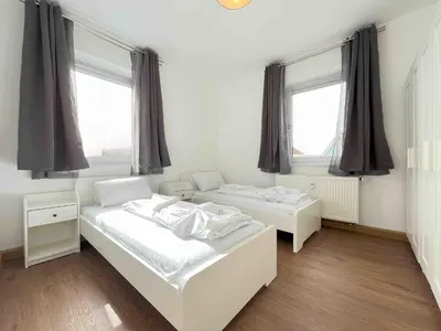 Ein Bett oder Betten in einem Zimmer der Unterkunft SAD231 - Moderne Monteurwohnung Übergangswohnung