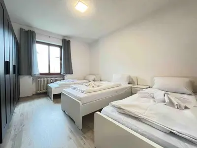 Ein Bett oder Betten in einem Zimmer der Unterkunft SAD113 - Geräumige Monteurwohnung