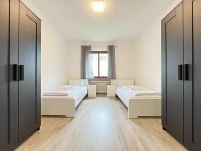 Ein Bett oder Betten in einem Zimmer der Unterkunft SAD113 - Geräumige Monteurwohnung