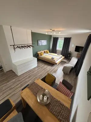 Ein Bett oder Betten in einem Zimmer der Unterkunft Zeit Raum Apartment Bayreuth