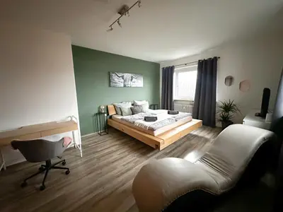 Ein Bett oder Betten in einem Zimmer der Unterkunft Zeit Raum Apartment Bayreuth