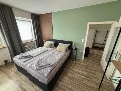 Ein Bett oder Betten in einem Zimmer der Unterkunft Zeit Raum Apartment Bayreuth