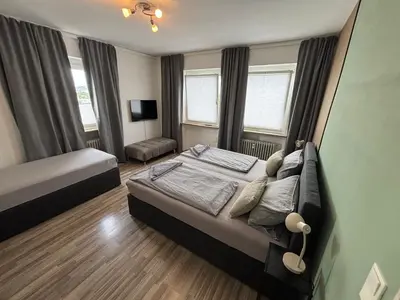 Ein Bett oder Betten in einem Zimmer der Unterkunft Zeit Raum Apartment Bayreuth
