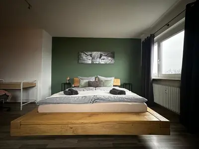 Ein Bett oder Betten in einem Zimmer der Unterkunft Zeit Raum Apartment Bayreuth