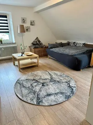 Ein Sitzbereich in der Unterkunft Ferienwohnungen Dörte & Stella Hof Saale