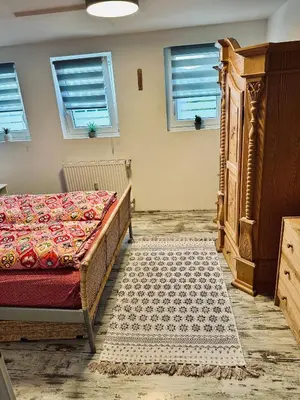Ein Bett oder Betten in einem Zimmer der Unterkunft Ferienwohnungen Dörte & Stella Hof Saale
