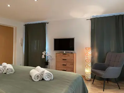Ein Bett oder Betten in einem Zimmer der Unterkunft Apartment Violine2 am Bahnhof-City