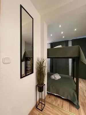 Ein Bett oder Betten in einem Zimmer der Unterkunft Apartment Violine2 am Bahnhof-City