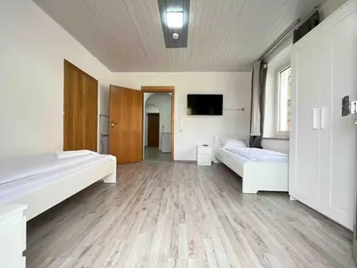 Ein Bett oder Betten in einem Zimmer der Unterkunft SAD213 - Smarte Monteurwohnung in super Lage