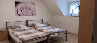 Ein Bett oder Betten in einem Zimmer der Unterkunft Ferienwohnung Eiblmaier