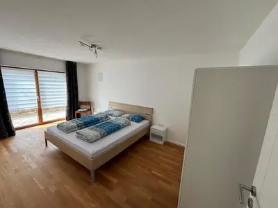 Ein Bett oder Betten in einem Zimmer der Unterkunft Ferienwohnung Steinbauer