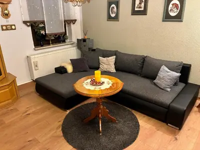 Ein Sitzbereich in der Unterkunft Ferienwohnung am Hammerberg