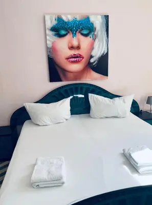 Ein Bett oder Betten in einem Zimmer der Unterkunft Siegener Balkon-Refugium