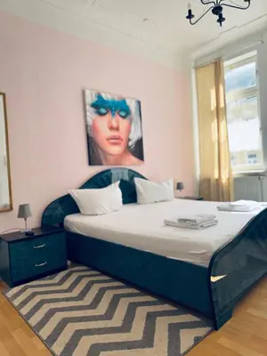 Ein Bett oder Betten in einem Zimmer der Unterkunft Siegener Balkon-Refugium