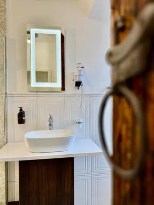 Ein Badezimmer in der Unterkunft Hotel Villa WUN