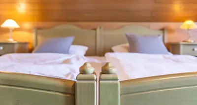 Ein Bett oder Betten in einem Zimmer der Unterkunft Gasthof Schiesl