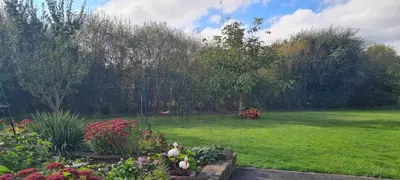 Ein Garten an der Unterkunft Ferienwohnung Macht