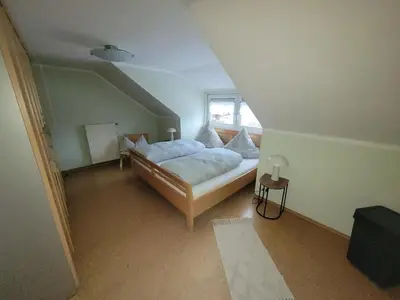 Ein Bett oder Betten in einem Zimmer der Unterkunft Ferienwohnung Macht