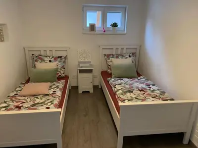 Ein Bett oder Betten in einem Zimmer der Unterkunft Ferienwohnung König