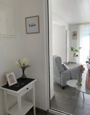 Ein Sitzbereich in der Unterkunft Ferienwohnung König