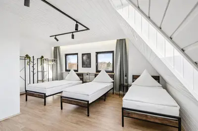 Ein Bett oder Betten in einem Zimmer der Unterkunft Charmantes 2 BR Apartment mit Parkplatz