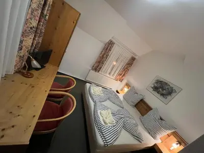 Ein Bett oder Betten in einem Zimmer der Unterkunft Attikos Hotel & Restaurant