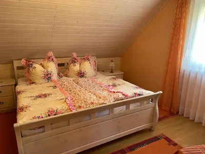 Ein Bett oder Betten in einem Zimmer der Unterkunft Ferienhaus Ochsenkopfblick