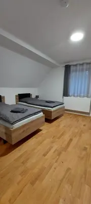 Ein Bett oder Betten in einem Zimmer der Unterkunft Gästezimmer Werwein