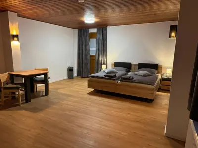 Ein Sitzbereich in der Unterkunft Gästezimmer Werwein