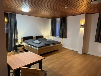 Ein Bett oder Betten in einem Zimmer der Unterkunft Gästezimmer Werwein