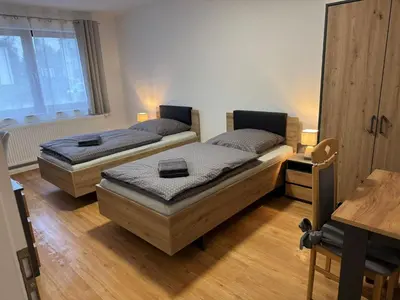 Ein Bett oder Betten in einem Zimmer der Unterkunft Gästezimmer Werwein