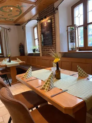 Ein Sitzbereich in der Unterkunft Brauereigasthof Püttner