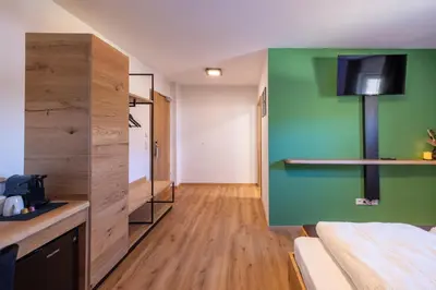 Ein Bett oder Betten in einem Zimmer der Unterkunft 8Rooms - Altstadthotel