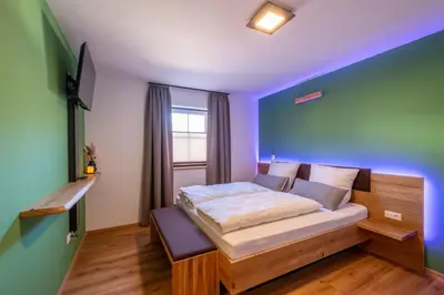 Ein Bett oder Betten in einem Zimmer der Unterkunft 8Rooms - Altstadthotel