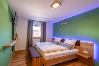 Ein Bett oder Betten in einem Zimmer der Unterkunft 8Rooms - Altstadthotel