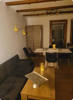 Ein Sitzbereich in der Unterkunft Rosenhof