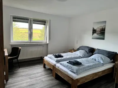 Ein Bett oder Betten in einem Zimmer der Unterkunft Stefanshof Neunburg